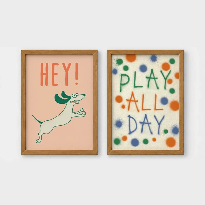 Set of 2 framed prints, playful kids' illustrations: a "Hey!" illustration of a leaping dachshund; and a "Play All Day" polka-dot typography print — unframed