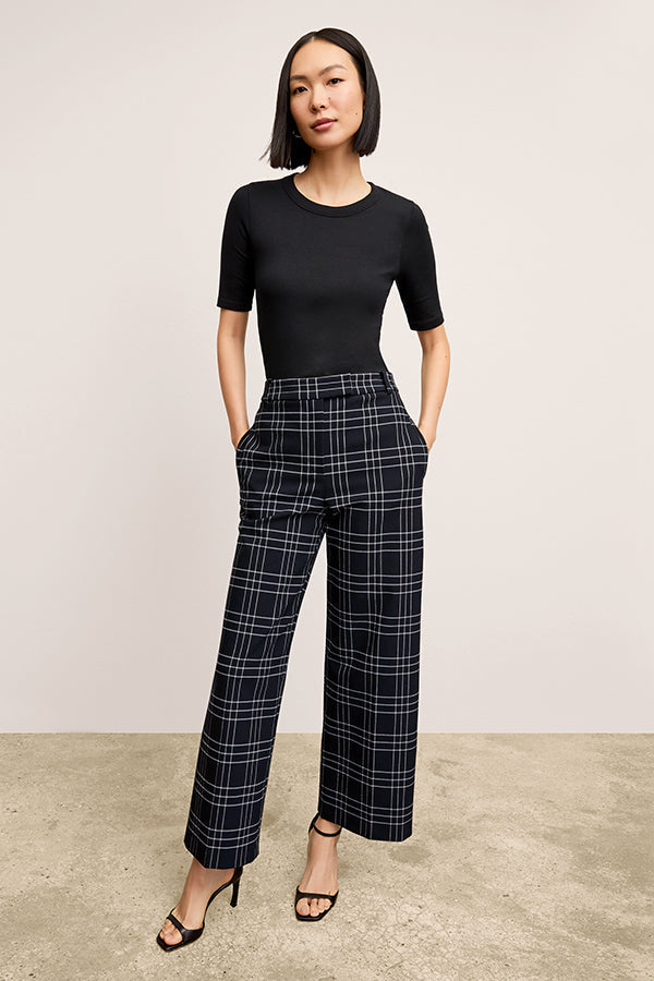 front image of a woman wearing the abby pant in plaid  | Exclude | Grid