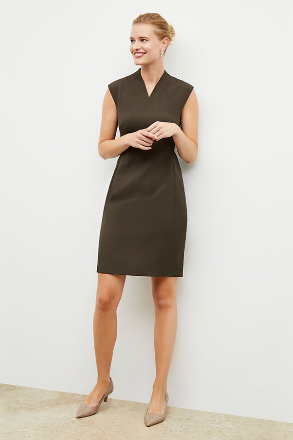 Front image of a woman wearing the Aditi Dress in Kale | Grid | Exclude
