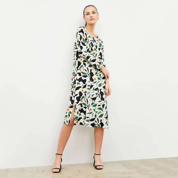 Front image of woman wearing the alesia dress in icon print | Lead