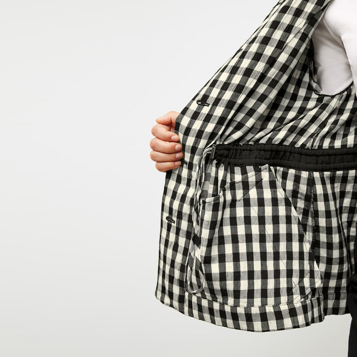 Detail image of a woman wearing the Allison Anorak - Luxe Gingham in black / white