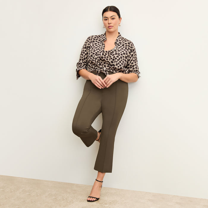 Front image of a woman wearing the allyn pants in ash