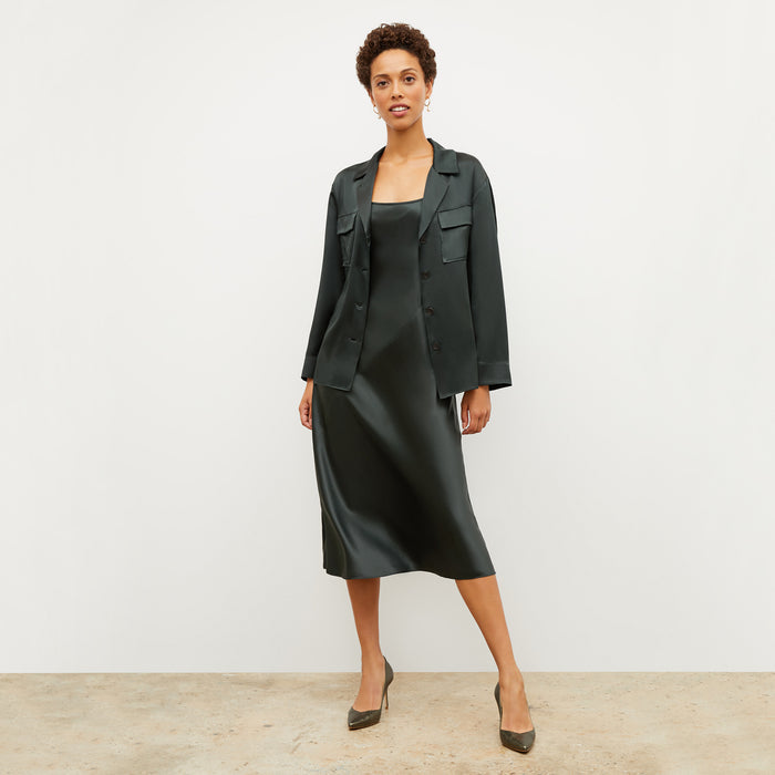 Image of a woman wearing the Alyssa Jacket in Hunter