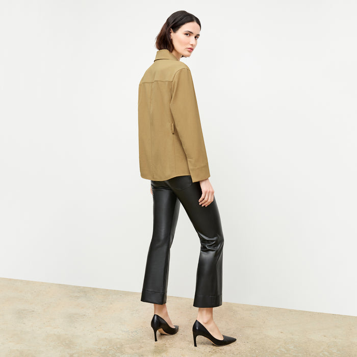 back image of a woman wearing the archie pant in black
