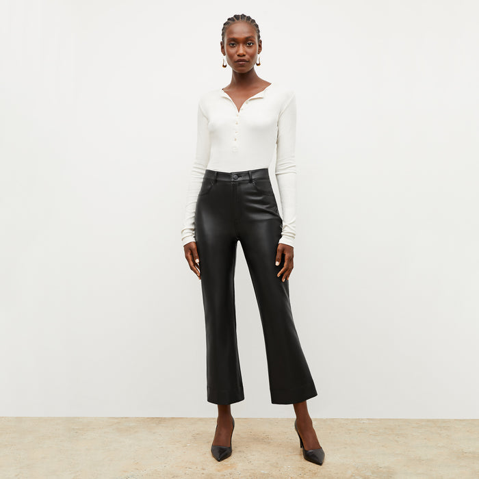 Front image of a woman wearing the archie pant in black | Exclude