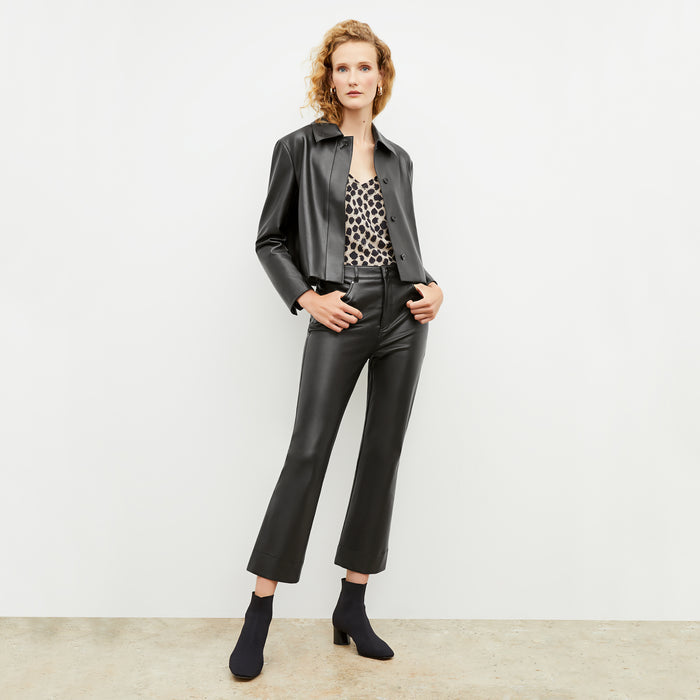 Front image of a woman wearing the archie pant in black