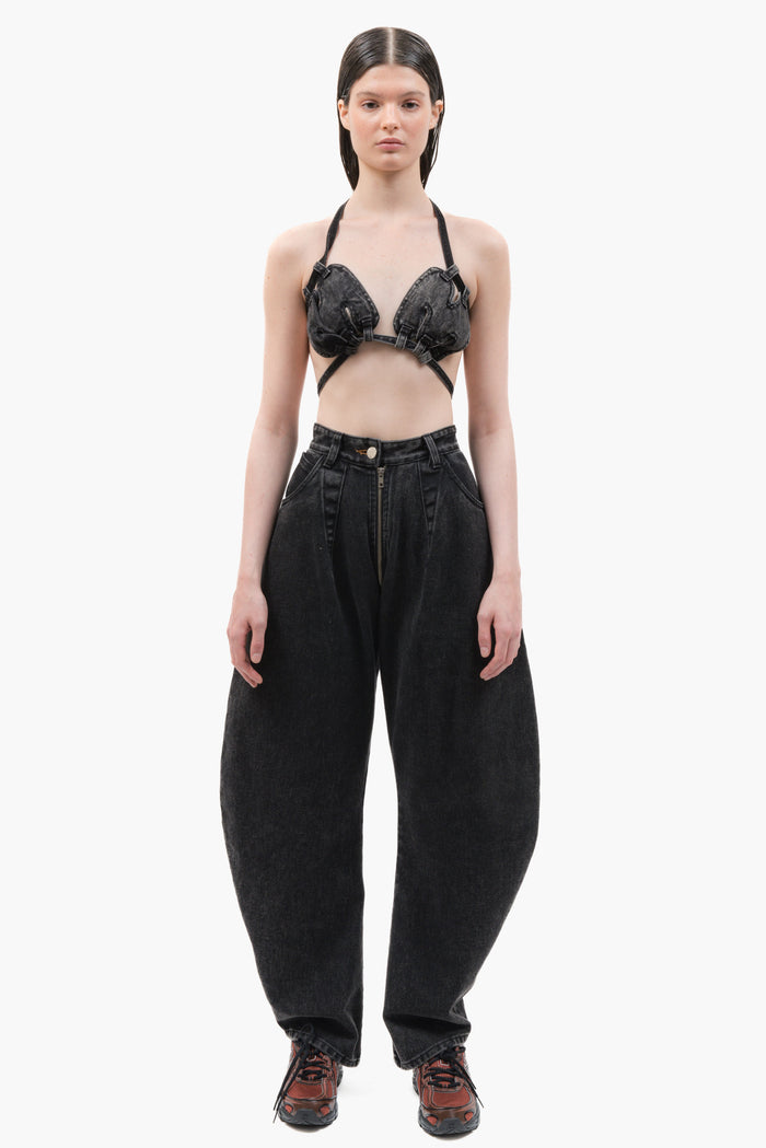 MANCANDY Balloon Zip Jeans in black stonewashed denim with visible front zipper detail and balloon-leg silhouette.