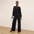 front image of a woman wearing the bia pants in black | Lead