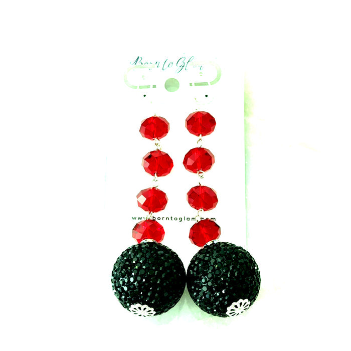 Black Gumball Red Crystal Statement Earring with a large black crystal sphere drop and vibrant red faceted crystal accents.