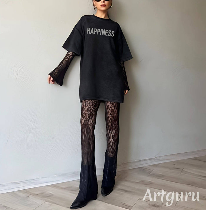 Black relaxed longline graphic lounge top with sheer layered lace sleeves and subtle Happiness text on the front.