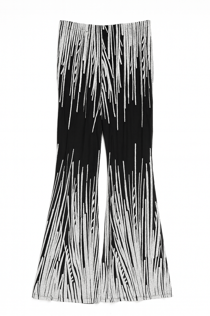 Black high-rise pant with a white linear sequin pattern and subtle flare leg styled as a statement party bottom.