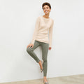 Front image of a woman wearing the Brodie Top in Meringue | Lead