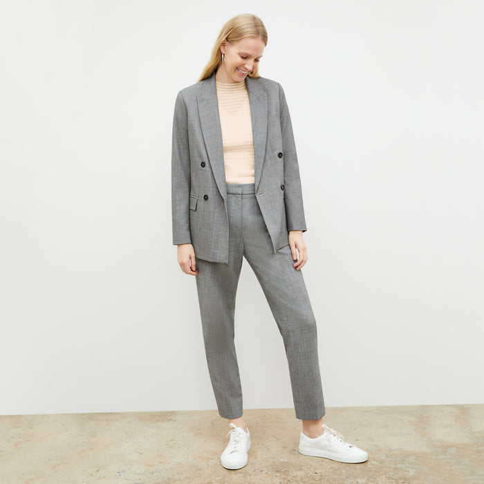 Front image of a woman wearing the Brodie Top in Meringue