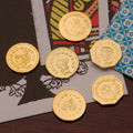 set of replica California Gold Rush Tokens with 6 tiny gold plated coins called ingots