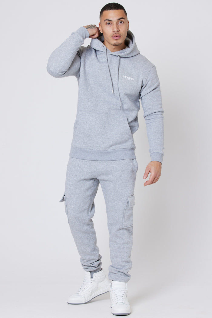 Man wearing grey marl fleece joggers and grey marl fleece hoodie from a multipack