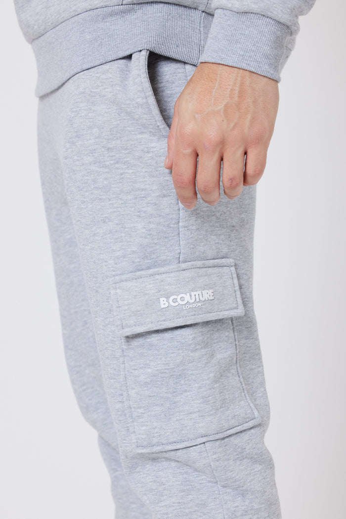 Close detail of mens grey marl cargo fleece joggers from a multipack