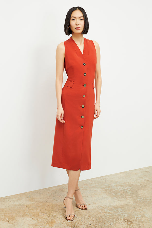 Front image of a woman wearing the Cassandra Dress in Blood Orange | Exclude | Grid