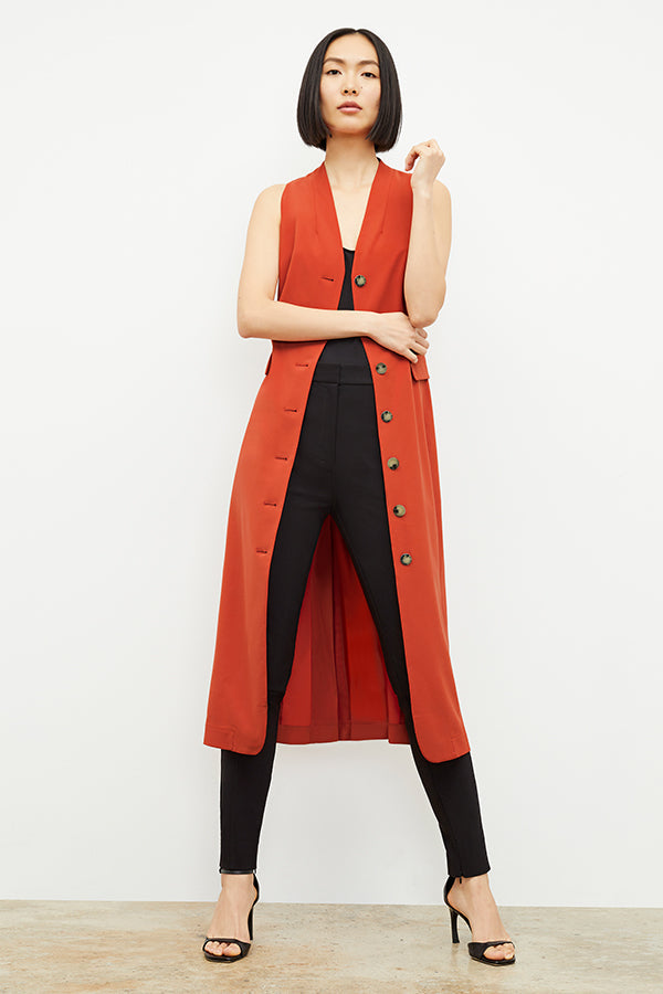 Front image of a woman wearing the Cassandra Dress in Blood Orange | Exclude | Grid Hover