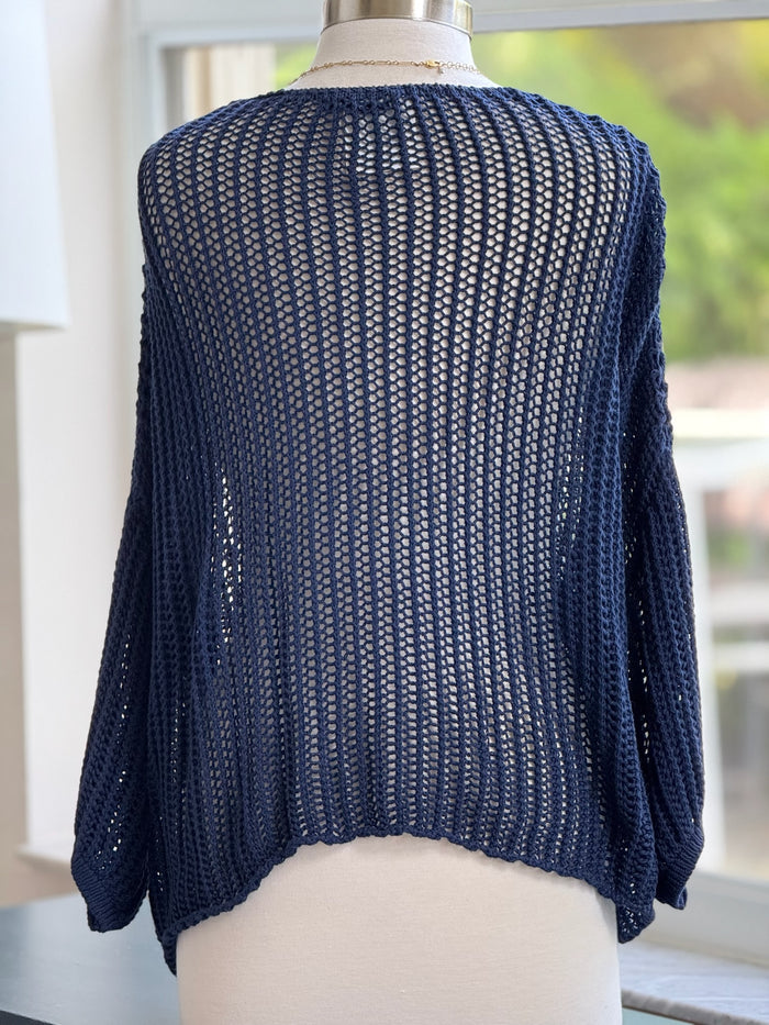 Cecilia crochet sweater shown on mannequin back view