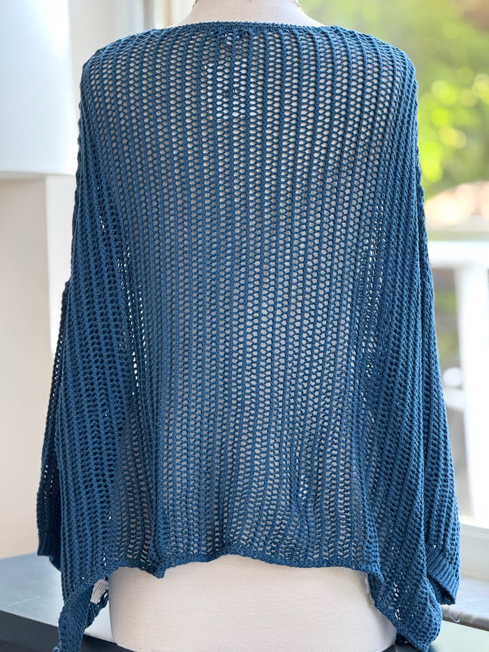 Cecilia crochet sweater in teal shown on mannequin back view