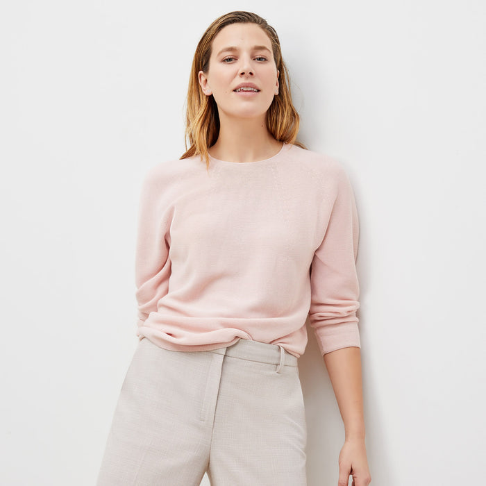 Front image of a woman standing wearing the chadwick top in peony | Lead