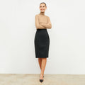 Image of a woman wearing the Chantal Skirt - Light Scuba in Forest | Lead