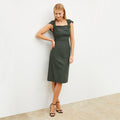 Image of a woman wearing the Charlene Dress in Dark Aloe | Lead