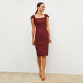 Front image of a woman wearing the Charlene Dress in Maroon | Lead