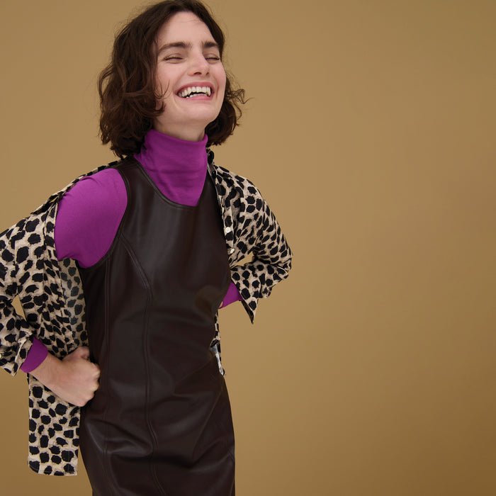 Front image of a woman wearing the Chloe Dress in Brown