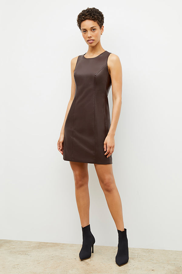 Front image of a woman wearing the Chloe Dress in Brown | Grid | Exclude