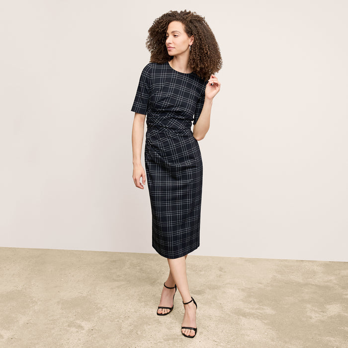 front image of a woman wearing the ciela dress in black/white | Lead