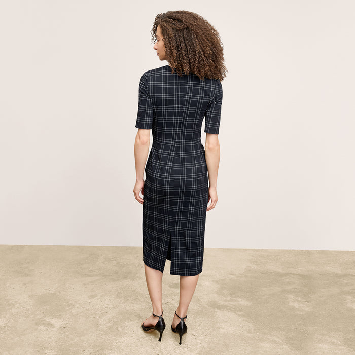 back image of a woman wearing the ciela dress in black/white
