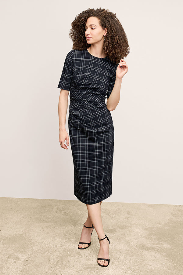 front image of a woman wearing the ciela dress in black/white | Exclude | Grid