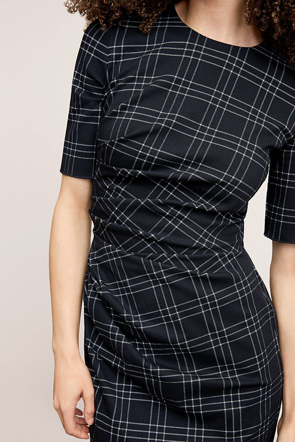 front image of a woman wearing the ciela dress in black/white | Exclude | Grid Hover
