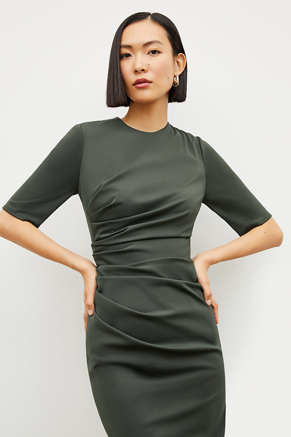 Image of a woman wearing the Ciela Dress in Dark Aloe | Grid Hover | Exclude