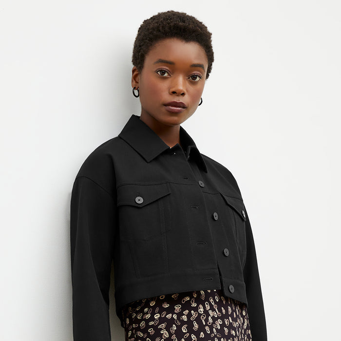 Front image of a woman wearing the Claressa Earrings in Black