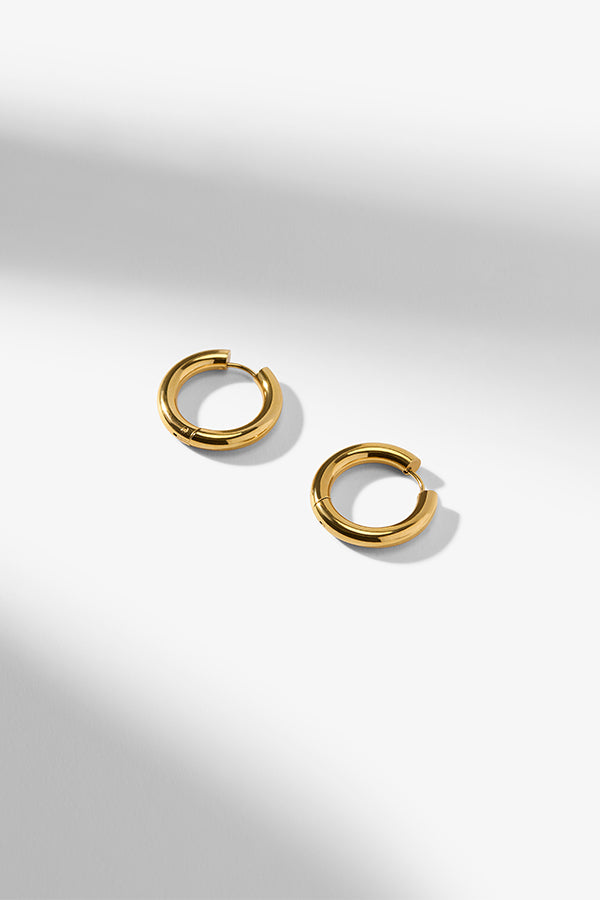 Packshot image of the Claressa Earrings in Gold | Grid | Exclude | Still