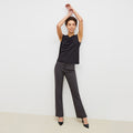 Front image of a woman standing wearing the clooney pant in charcoal melange | Lead