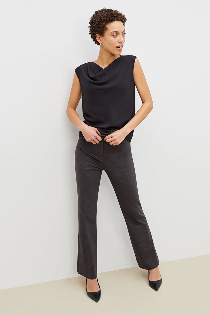 Front image of a woman standing wearing the clooney pant in charcoal melange | Grid | Exclude