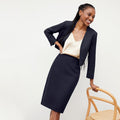 Front image of a woman wearing the Cobble hill skirt in galaxy blue | Lead