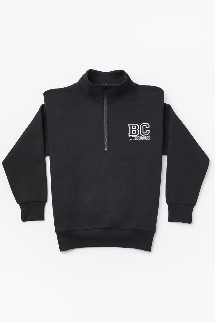 The Collingwood Half-Zip Sweatshirt & Leggings Set in black features an oversized half-zip sweatshirt with a high collar and BC LONDON logo, perfect for pairing with high-waisted leggings for a chic athleisure look. Displayed flat on a white background.