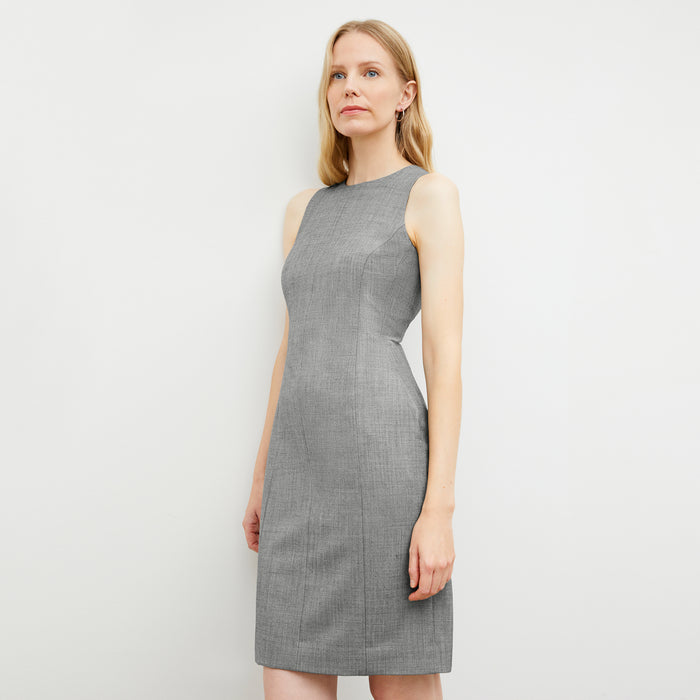 Side image of a woman wearing the constance dress in black and white