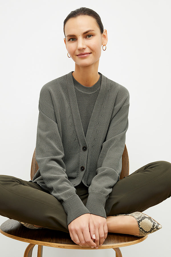 front image of a woman wearing the cookie cardigan in fossil | Exclude