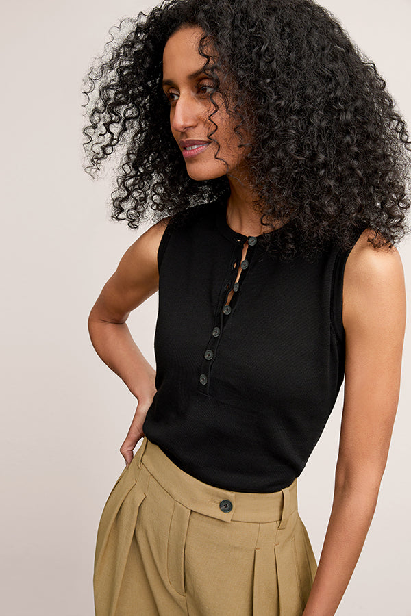 image of a woman wearing the crimmins top in black | Exclude | Grid