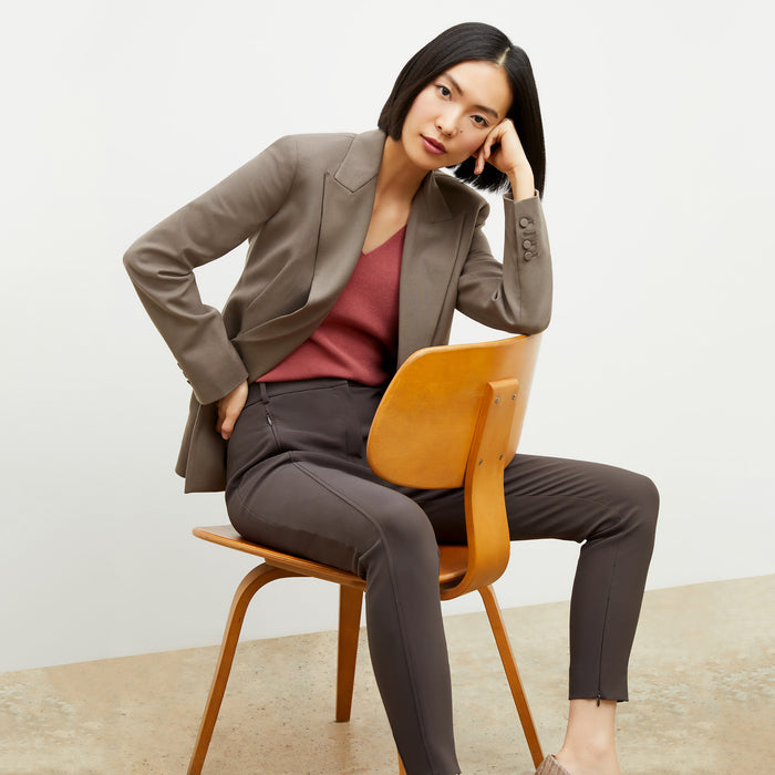 Side image of a woman wearing the Curie Pant in Dark Mink
