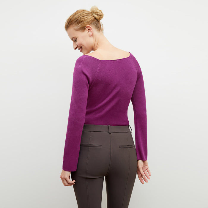 Back image of a woman wearing the Curie Pant in Dark Mink