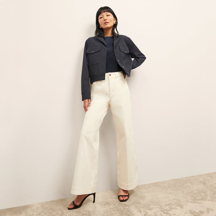 Front image of a woman wearing the Didion Top in Galaxy Blue