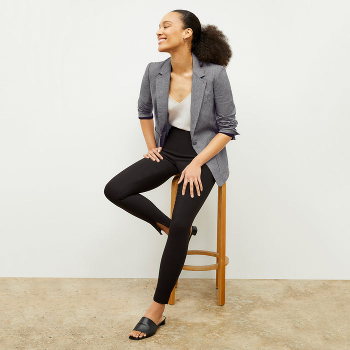 front image of a woman wearing the dolly jacket in gingham linen