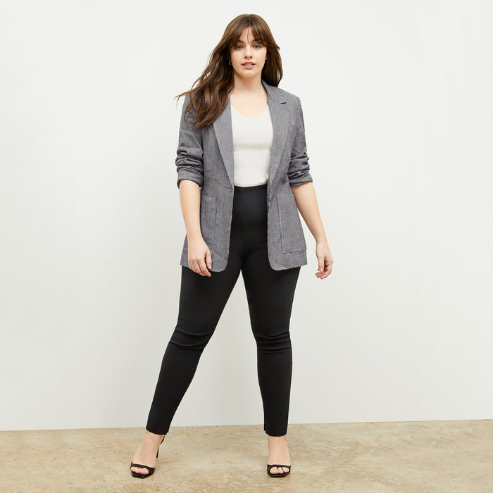 front image of a woman wearing the dolly jacket in gingham linen