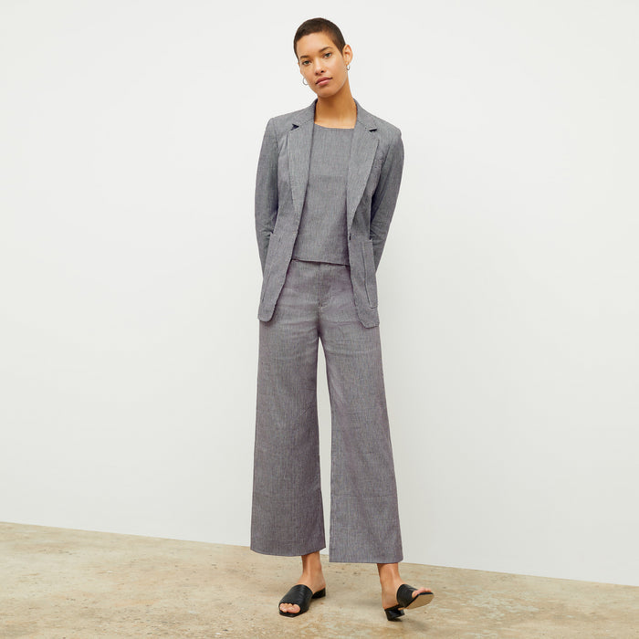 front image of a woman wearing the dolly jacket in gingham linen